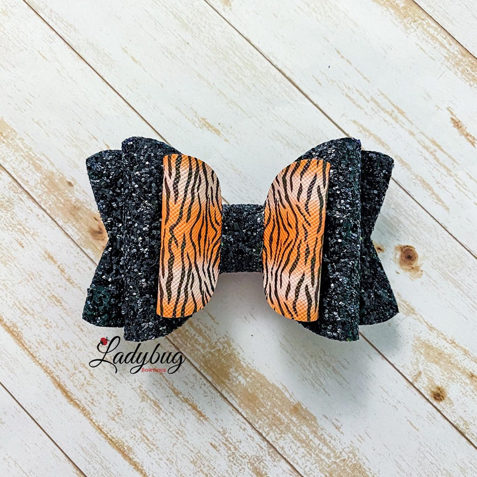 4-inch black sparkle tiger bow